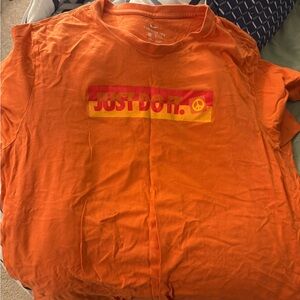 Nike Vibrant Orange Tee with Red Graphic